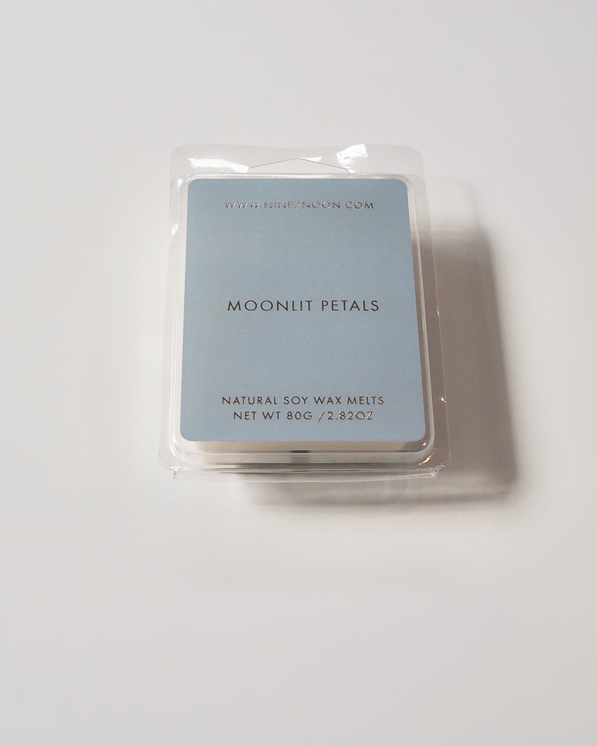 Nine2Noon Moonlit Petals wax melt made with natural soy wax.
